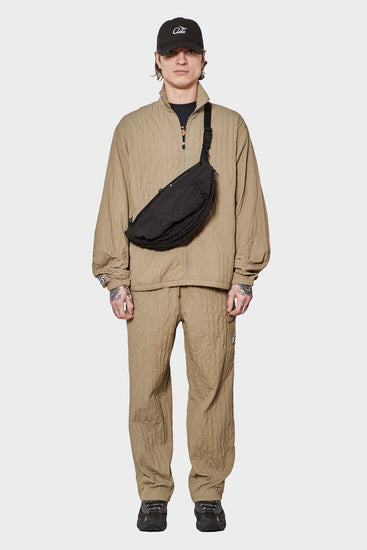 Штани RESCUE PLEATED CARGO оливкові від PLEASURES купити онлайн у магазині NEWBORN K