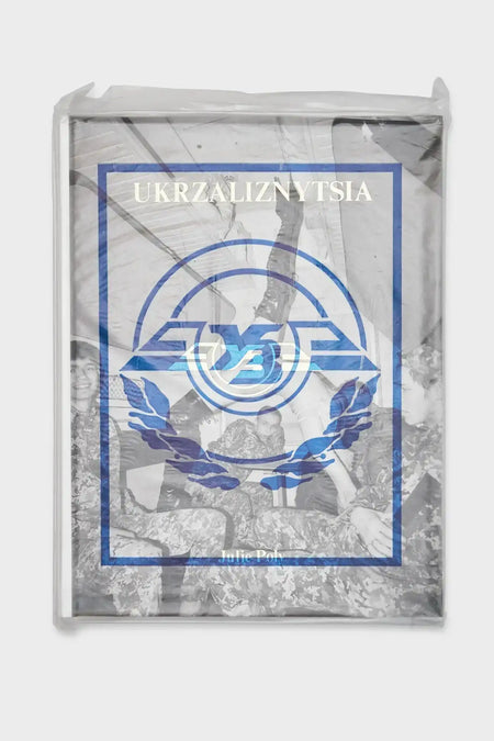 Ukrzaliznytsia photobook by Julie Poly, featuring soldiers in uniform, packaged in plastic